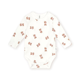 White Tumbling Bow Huxette Long Sleeves Onesie