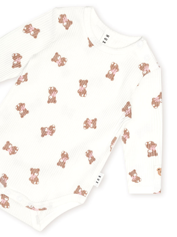 White Tumbling Bow Huxette Long Sleeves Onesie