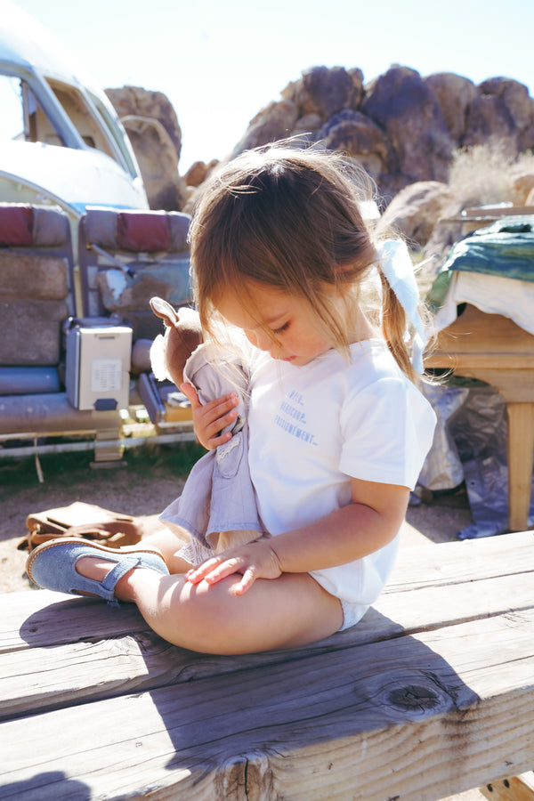 White With Blue Graphic Onesie